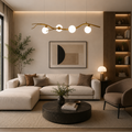 Modern living room with beige sectional sofa, round coffee table, and decorative lighting.