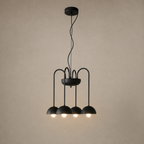 Modern black pendant light fixture on a beige background