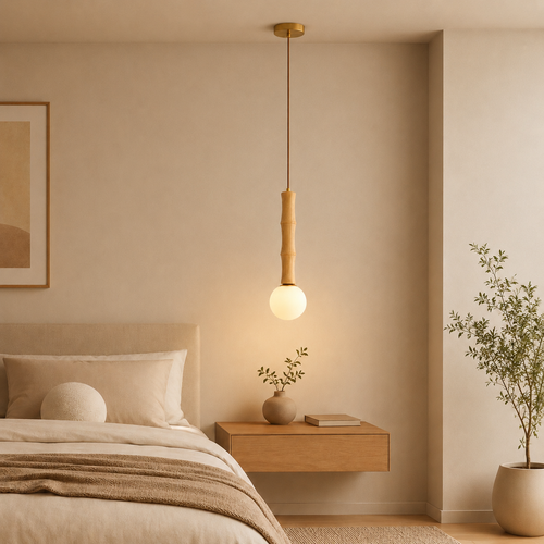 Modern bedroom with a pendant light, bed, and side table.