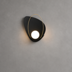 Modern wall light fixture on a gray wall