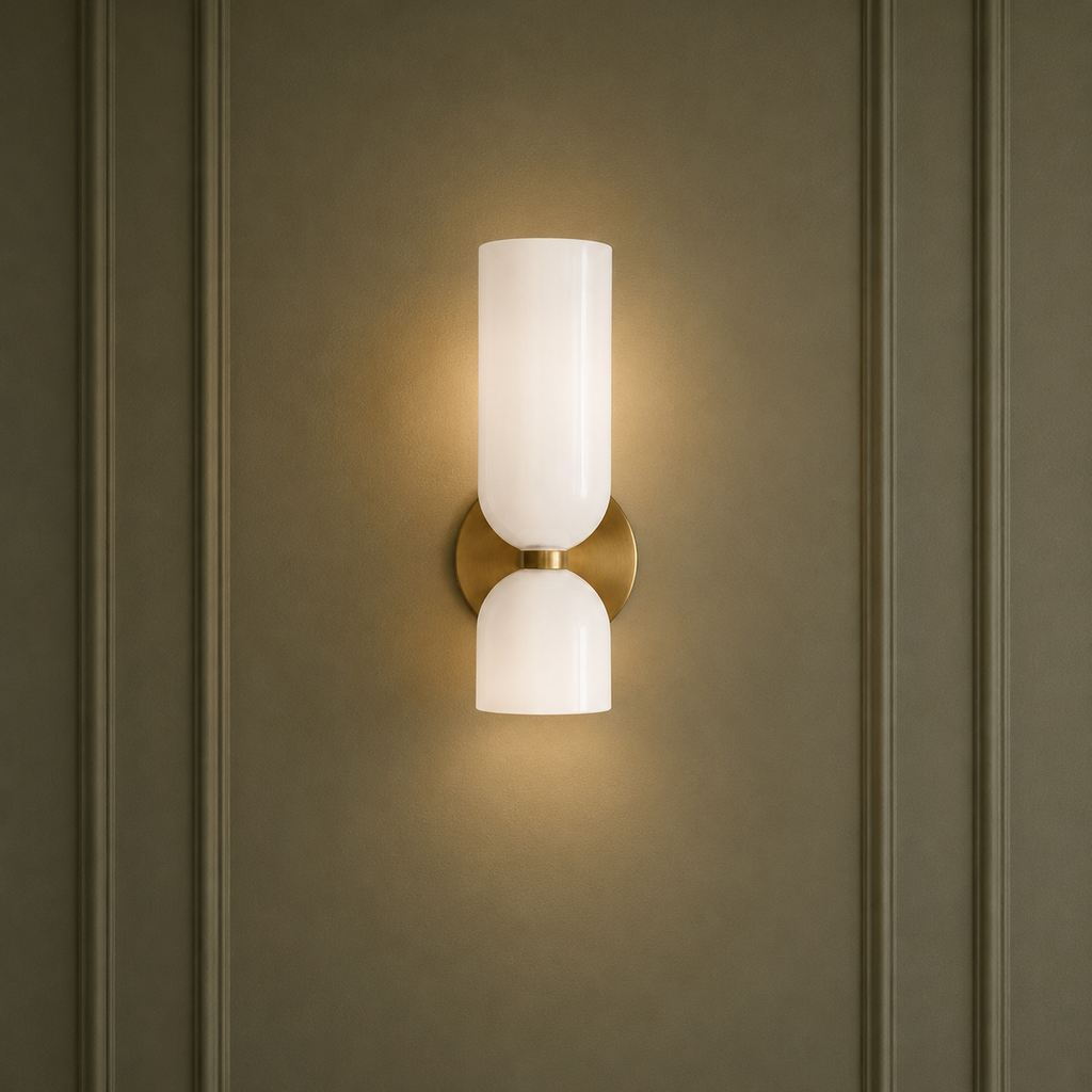 Wall-mounted light fixture with two glass shades on a beige wall.