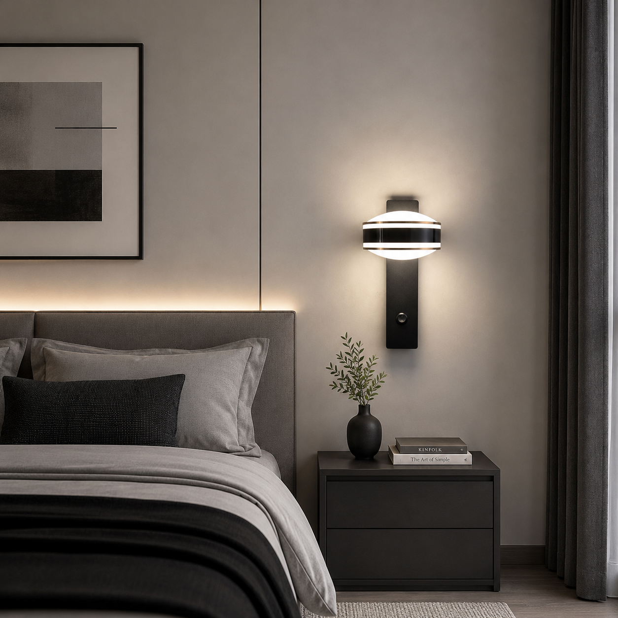 Modern bedroom with a bed, nightstand, wall lamp, and decor items.