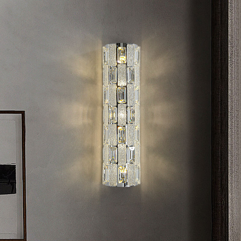 Crystal wall sconce on a gray wall