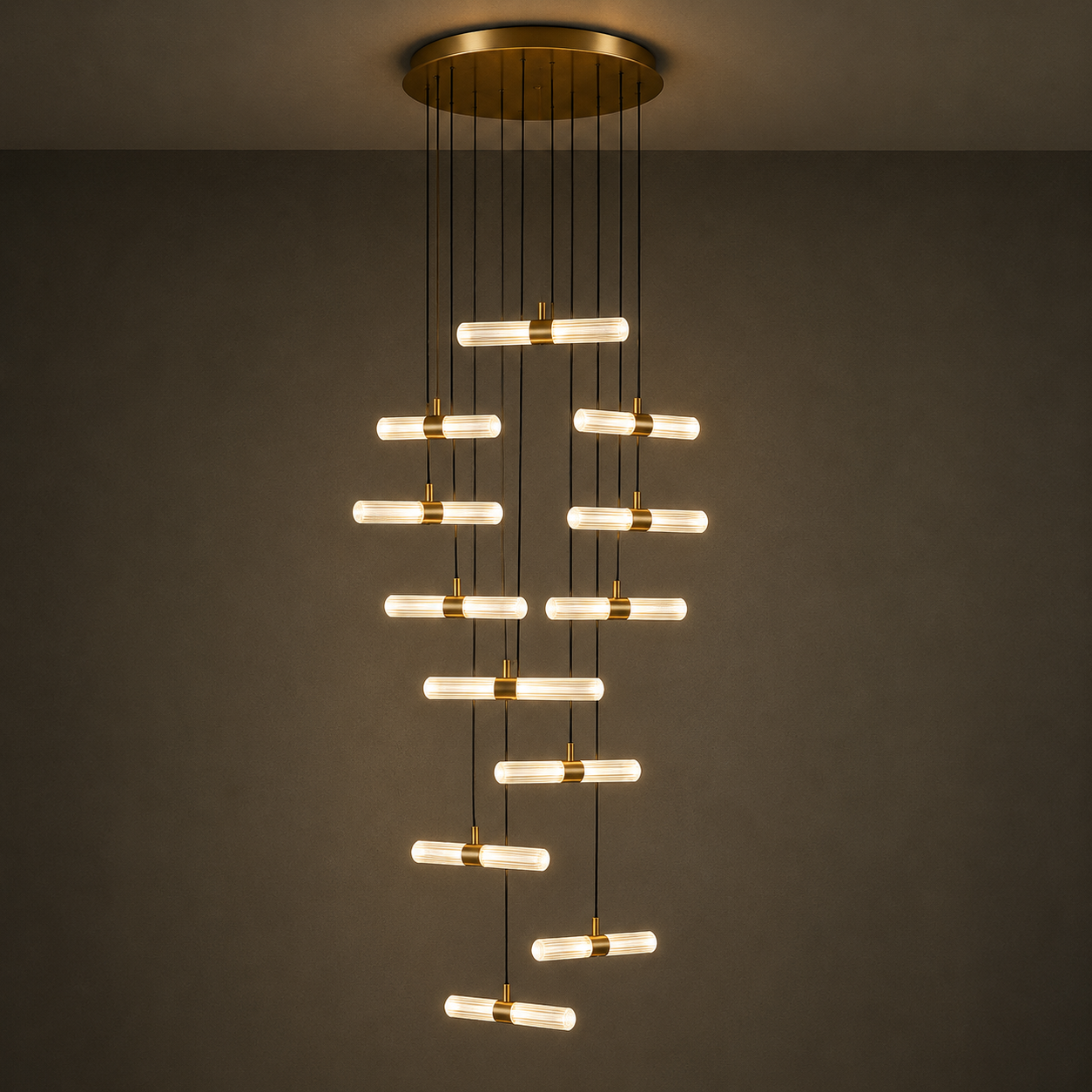Modern chandelier with gold accents on a dark background