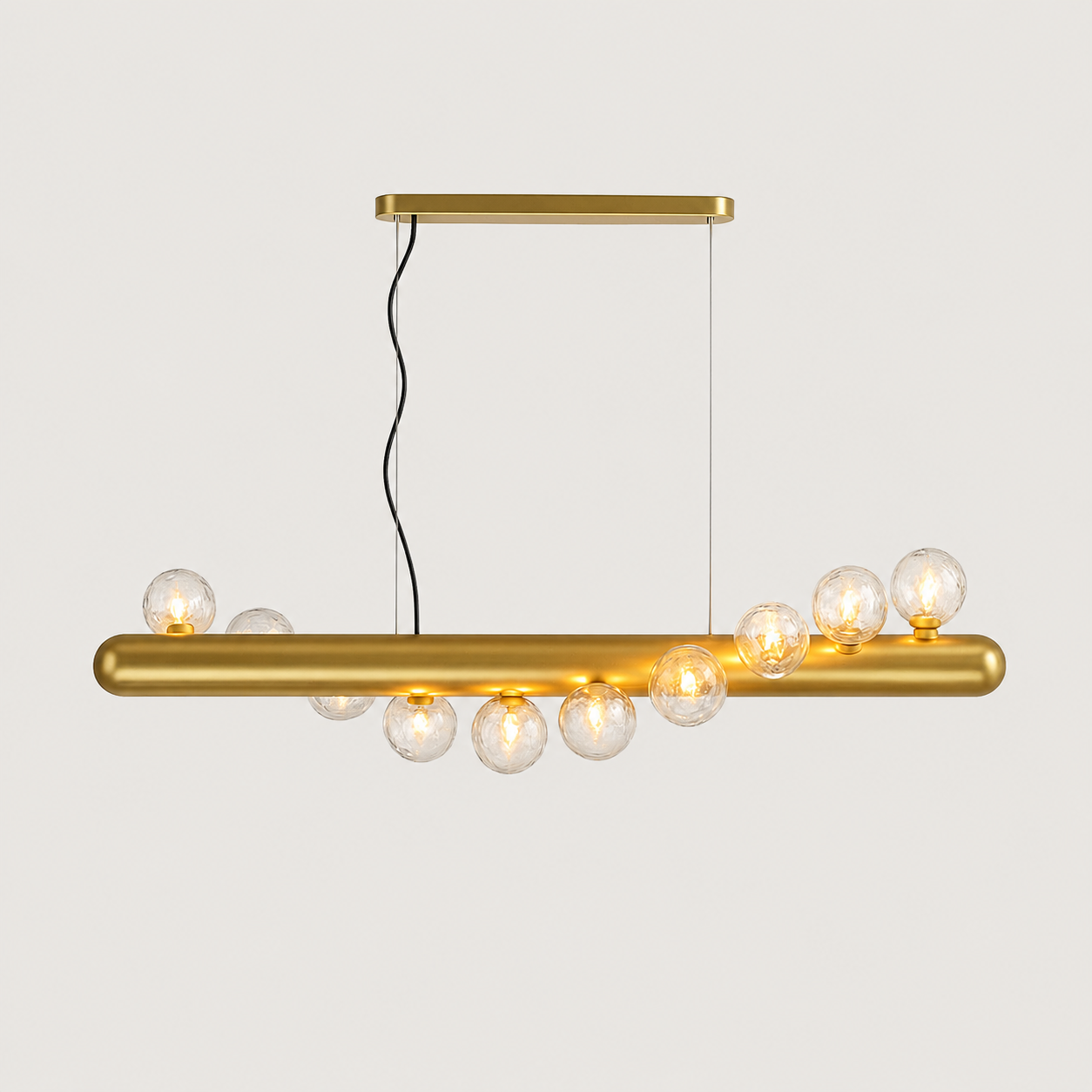 Gold pendant light with multiple bulbs on a white background