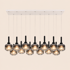 Modern chandelier with multiple glass lampshades on a beige background