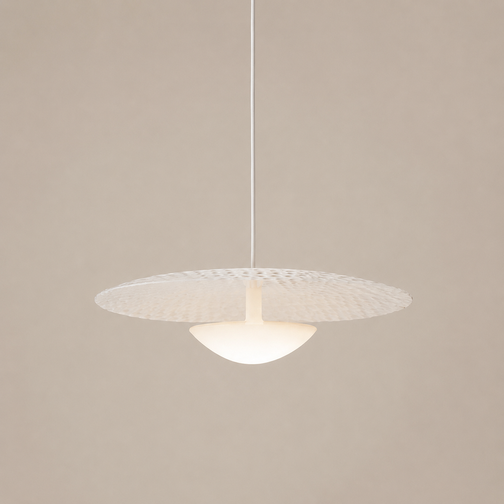 Modern pendant light with textured shade on a beige background