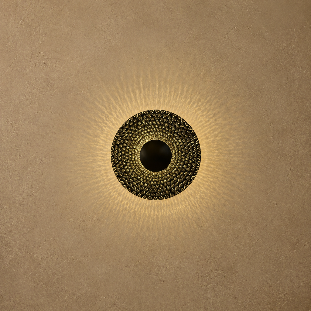 Decorative wall light fixture on a beige wall