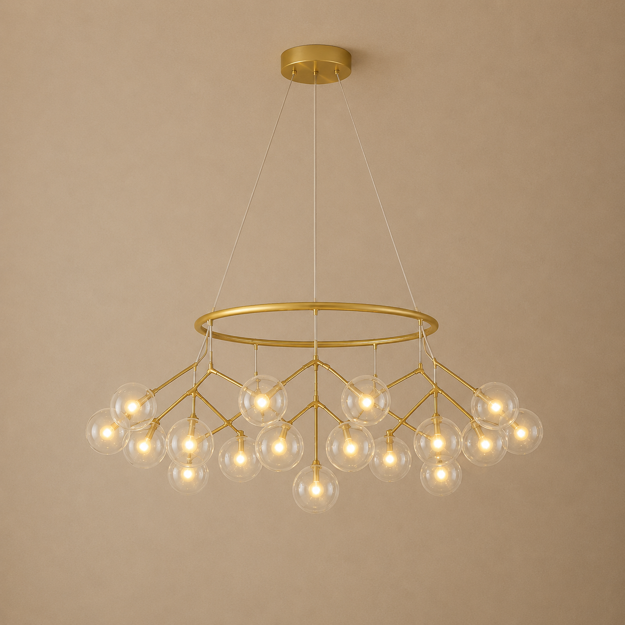 Gold chandelier with multiple bulbs on a beige background