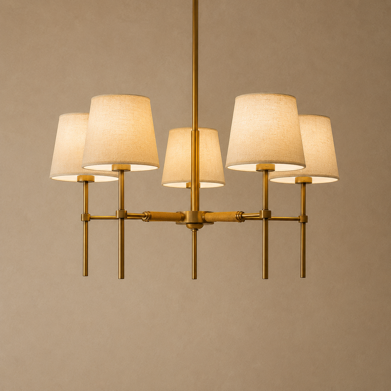 Modern chandelier with five lampshades on a beige background