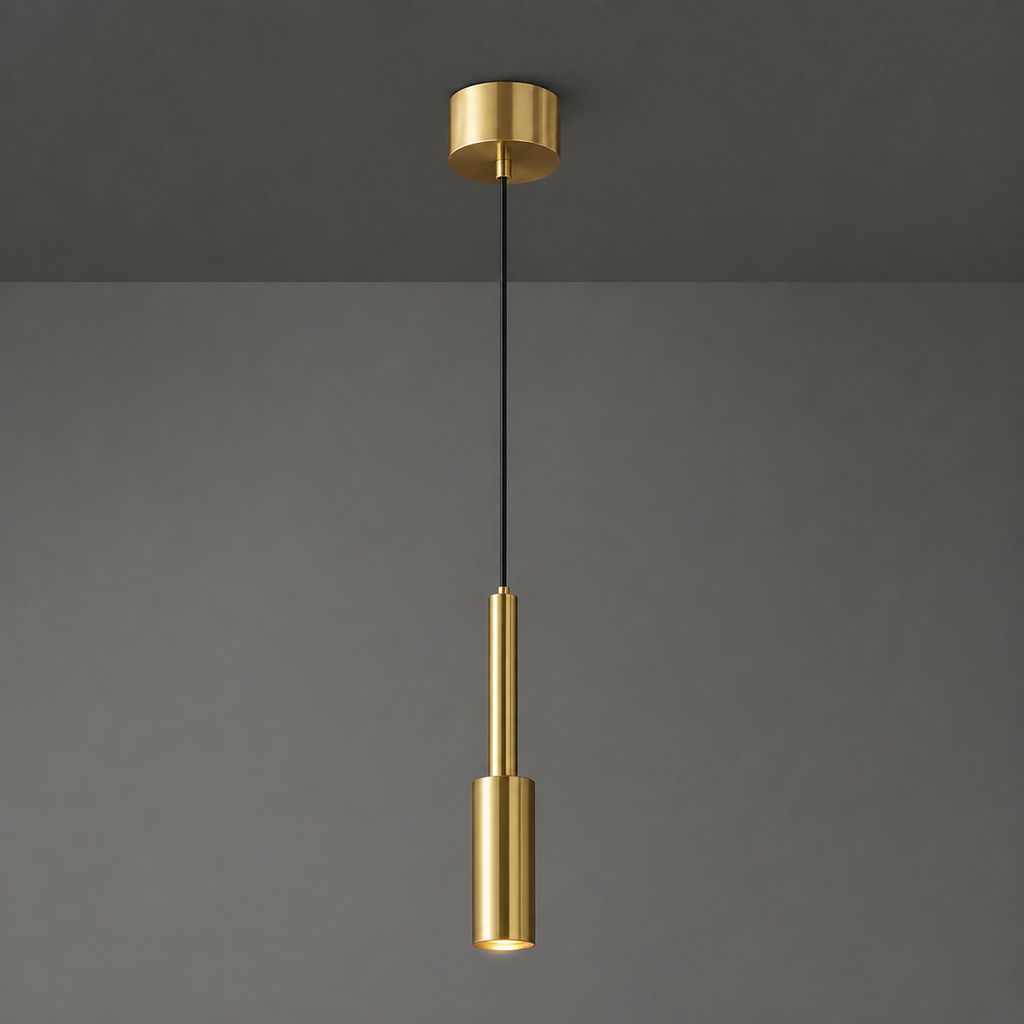 Gold pendant light fixture on a gray background