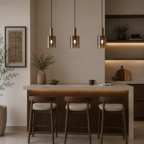 Modern kitchen with pendant lights, bar stools, and a neutral color palette.