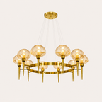 Gold chandelier with multiple glass bulbs on a white background
