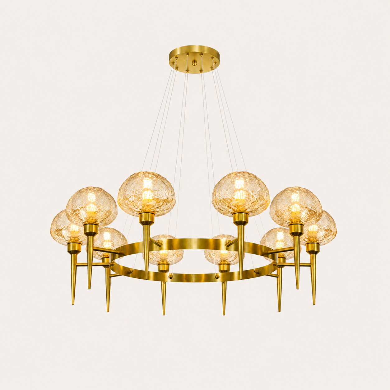 Gold chandelier with multiple glass bulbs on a white background