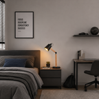 Modern bedroom with bed, desk, and motivational poster on wall