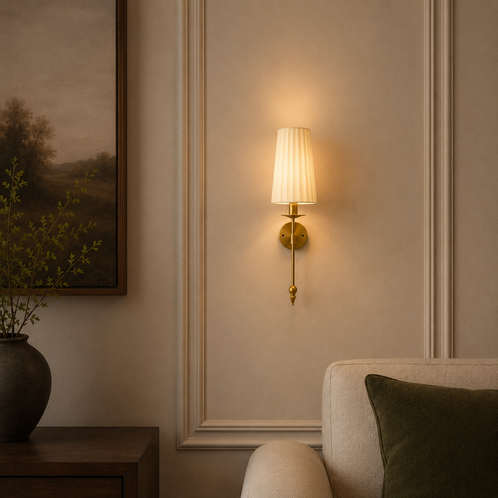 Wall-mounted lamp in a room with a painting and a chair.